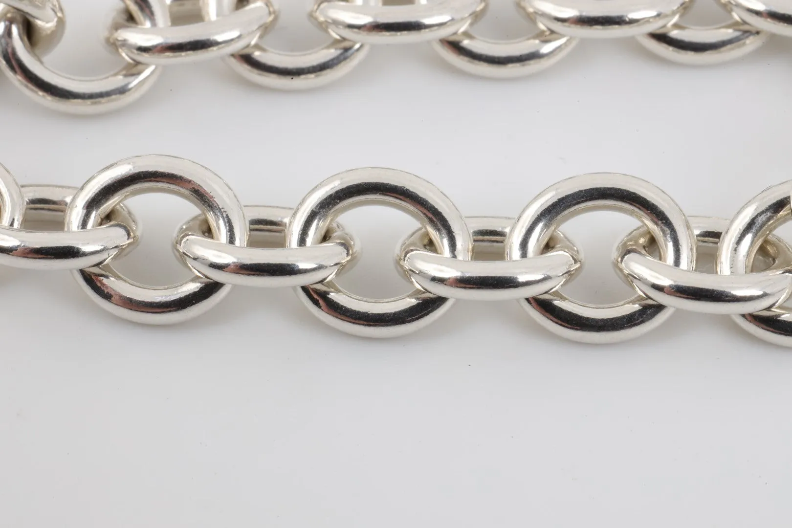 7.5" Tiffany & Co. 925 Silver Round Tag Bracelet (36.56g.)