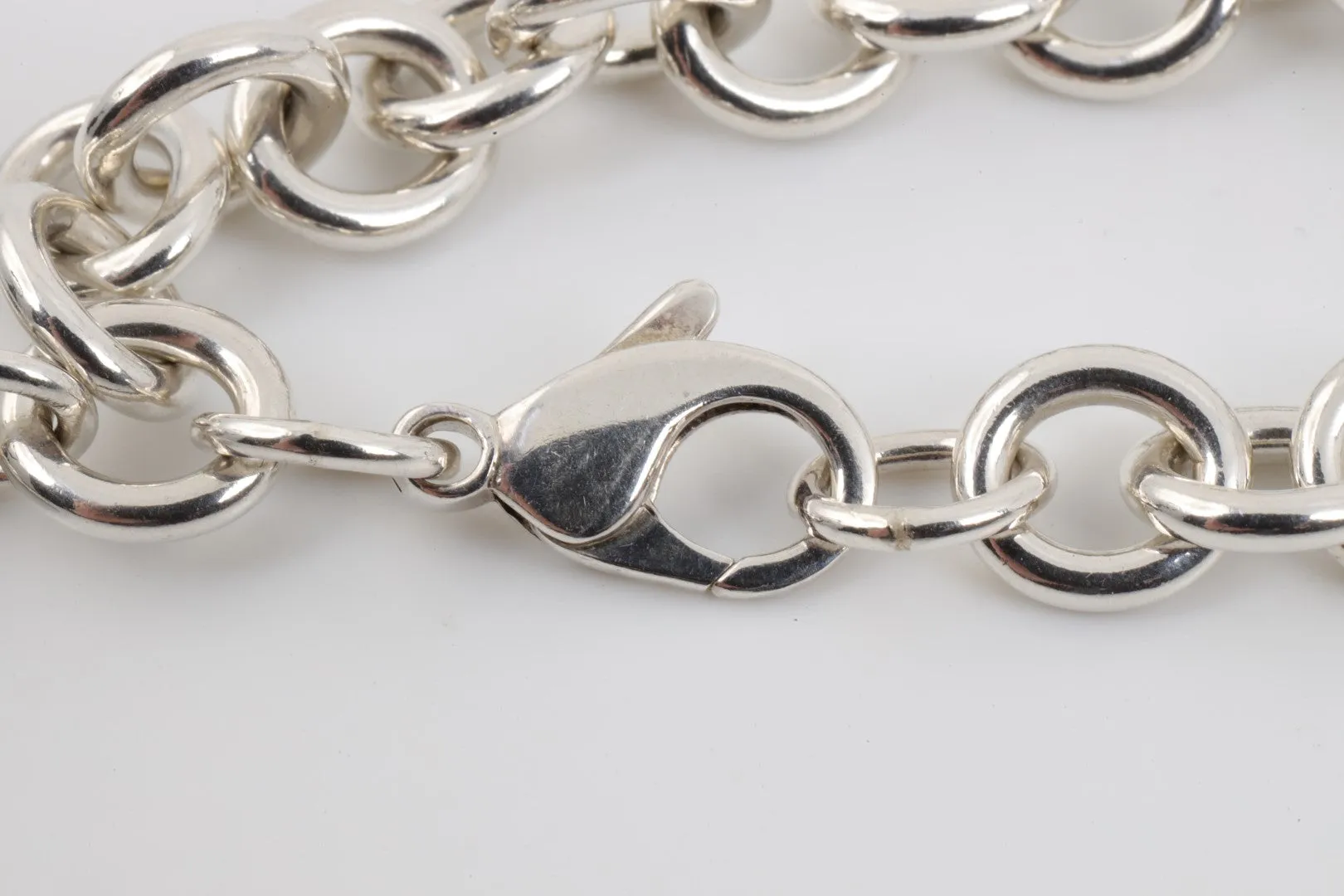 7.5" Tiffany & Co. 925 Silver Round Tag Bracelet (36.56g.)