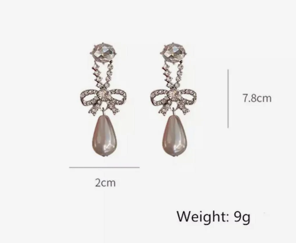 Bow and Pearl drop earrings